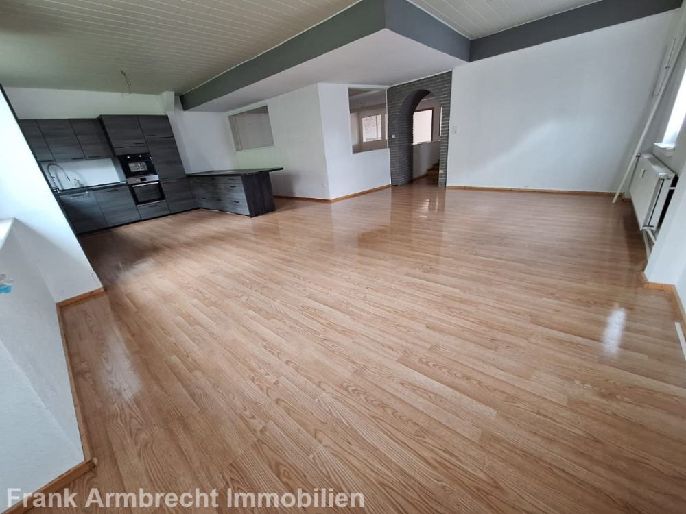 Wohnzimmer mit Küche